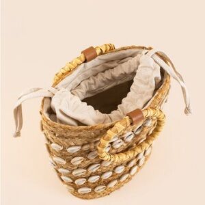 Francesca’s Jennifer Shell Straw Clutch